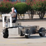 Roam Transport MicroWay chassis in turn on parking lot test. MegaRail